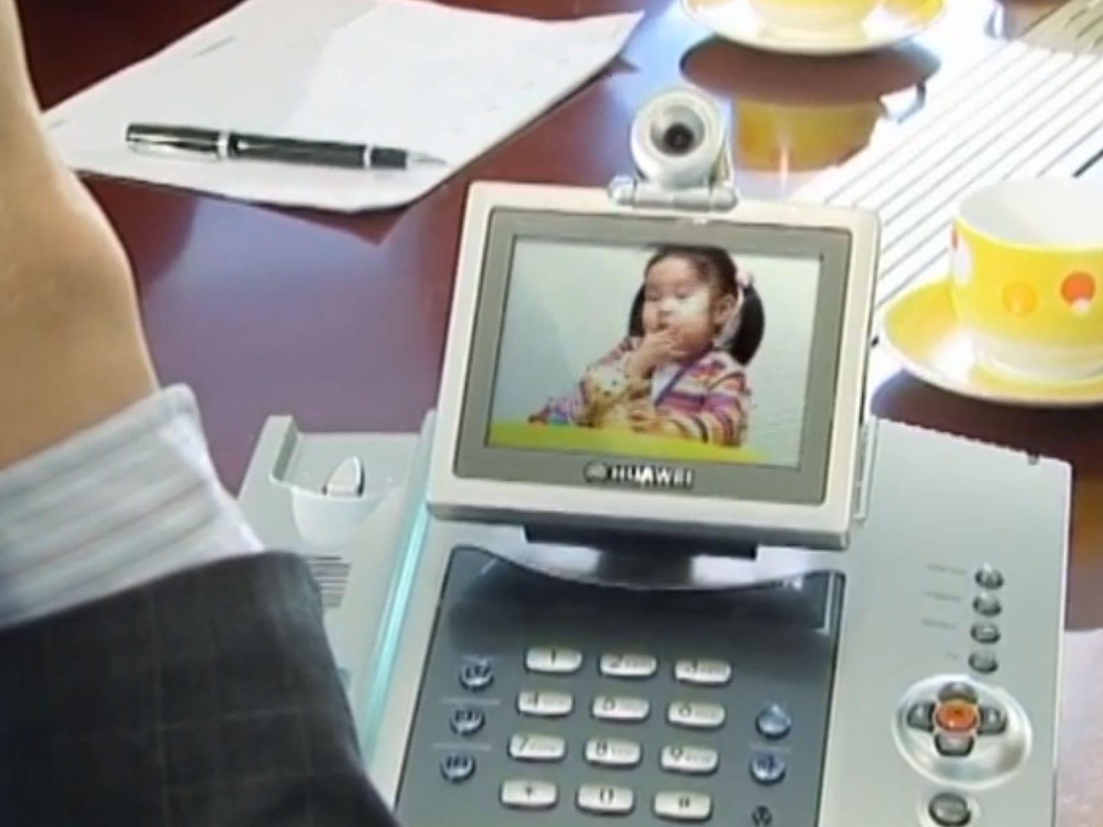 A video call with a child on an early multimedia telephone.